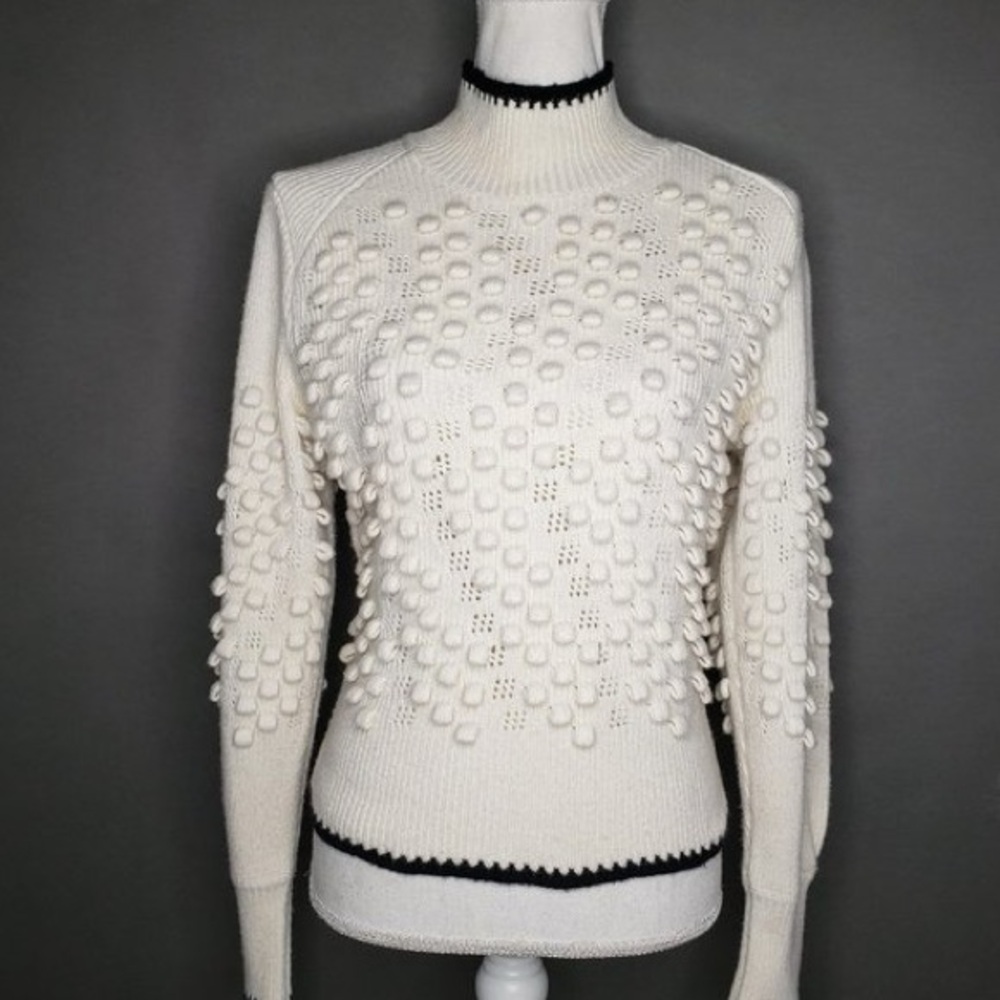 Elegant Cream Sweater with Textured Design